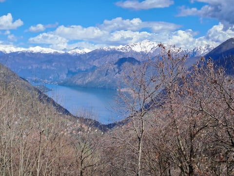 The house in the woods in Casasco with lake view