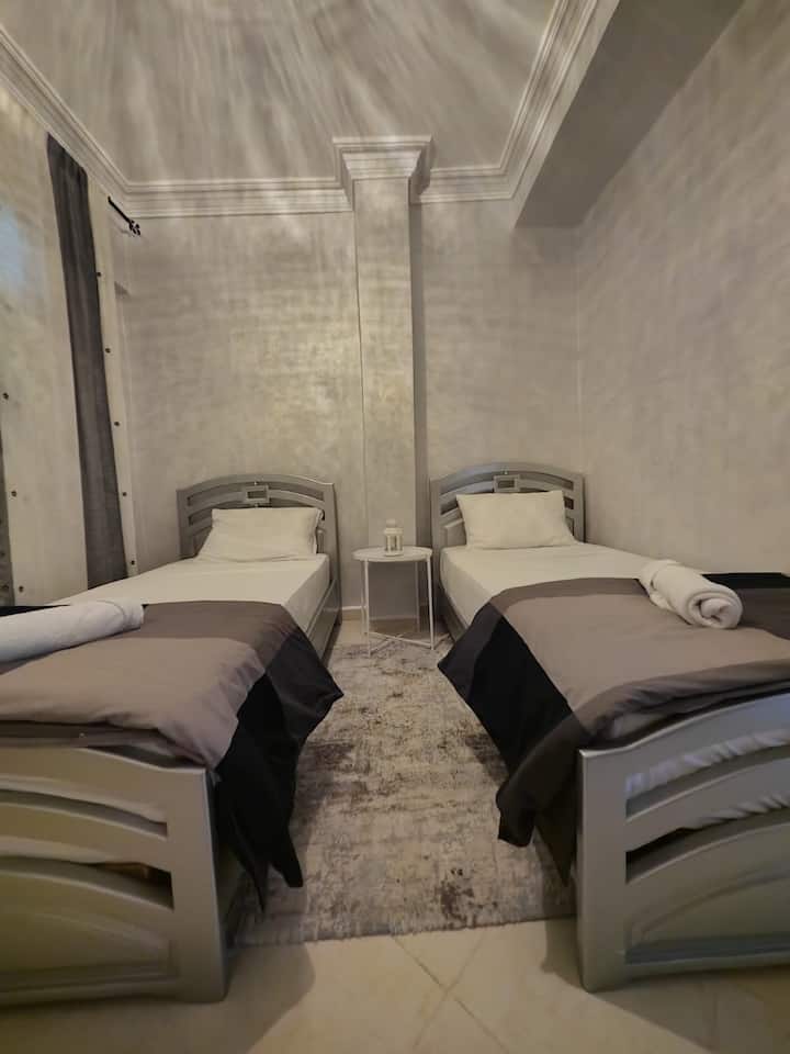 2 single beds, towels, mosquito net, hanger for clothes, cover, pillows...