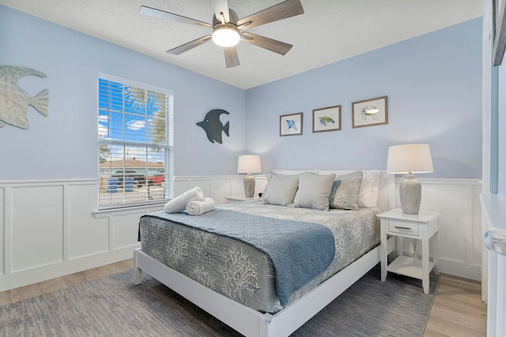 Make Yourself at Home in Our Beautiful Vacation Rental Guest Bedroom ❤️ featuring a Queen Bed.
