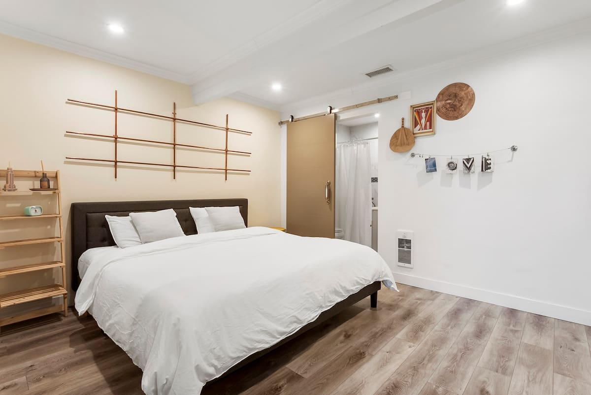 Primary king bedroom in Clairemont San Diego rental with dedicated workspace desk