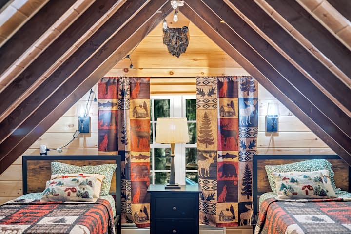 Loft with two twin beds. Also has foosball table