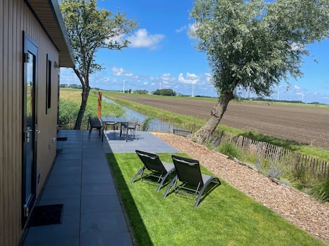 Entire house with unobstructed views and fenced garden