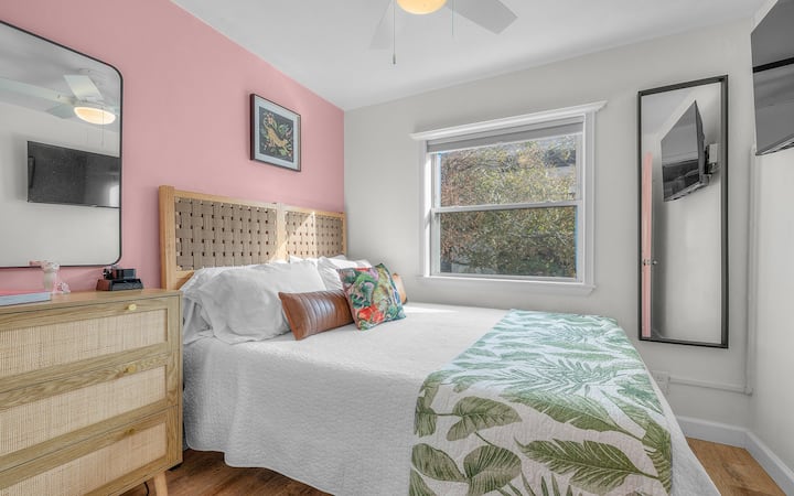 The bedroom features a plush and inviting queen-sized bed, adorned with soft linens and pillows to ensure a restful night's sleep.  Blackout Cordless Cellular Shades, Honeycomb Pleated Shade Insulation Room Darkening Blinds for a good night's rest.