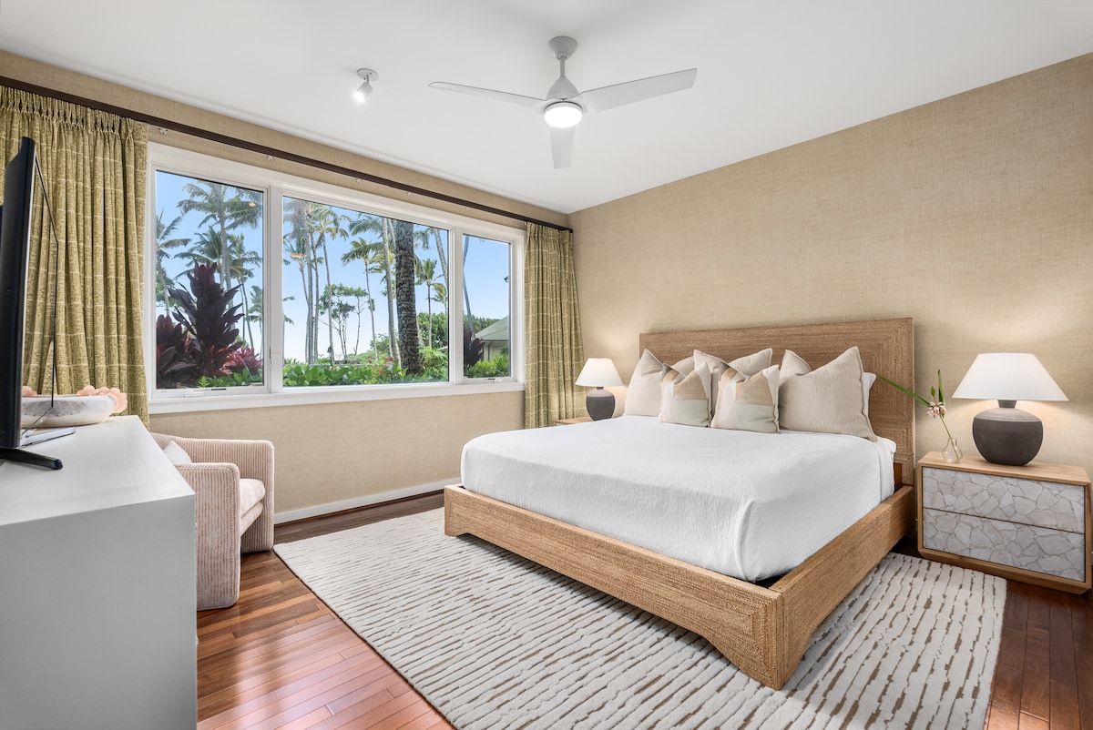 The master suite offers breathtaking view of the outdoors and has been thoughtfully upgraded with elegant furnishings. It includes a flat-screen TV, a spacious walk-in closet, and a beautifully appointed ensuite.