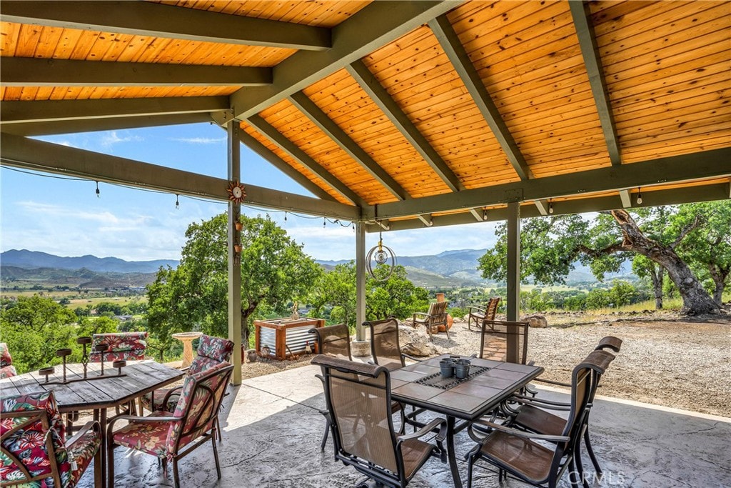 Our SHARED pergola with tongue and groove pine ceiling, and million dollar views of the Mayacamas will keep you dry in Winter and cool in Summer. It has a ceiling fan and misters a