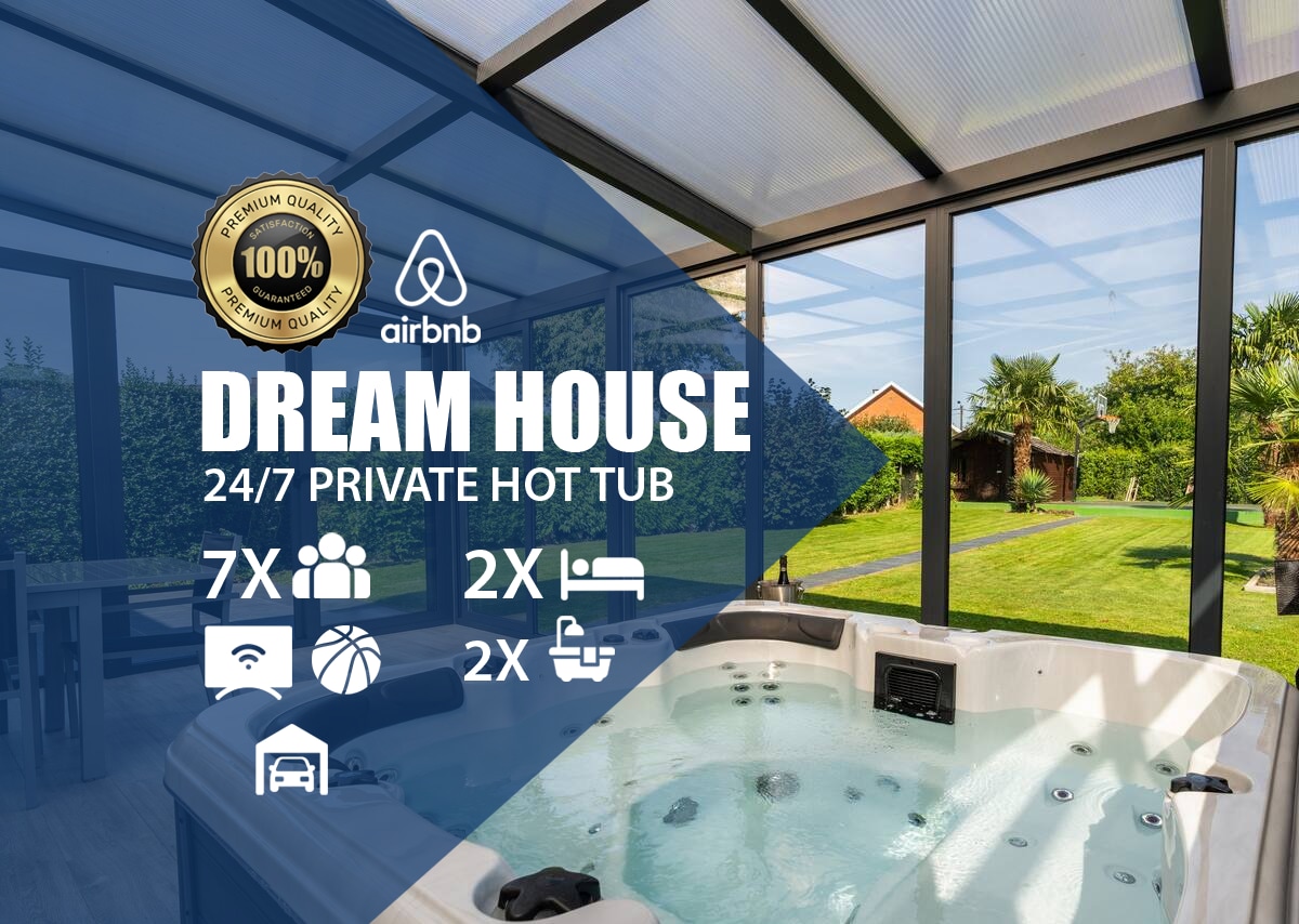 A spacious glass-enclosed area features a private hot tub, surrounded by lush greenery. Sunlight filters through the translucent roof, illuminating the inviting space. The well-manicured garden is visible outside, providing a serene backdrop.
