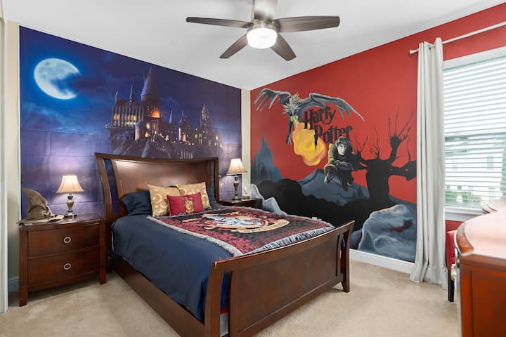 Be transported into this Harry Potter themed room W/ a life like mural of Harry Potter in action and a fire breathing dragon.  The space features magical accents. Feel as though you are in Hogwarts on this cozy queen bed for a spellbinding experience