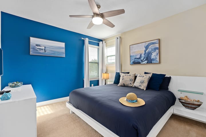 Ocean themed bedroom with king size bed and en-suite full Bathroom