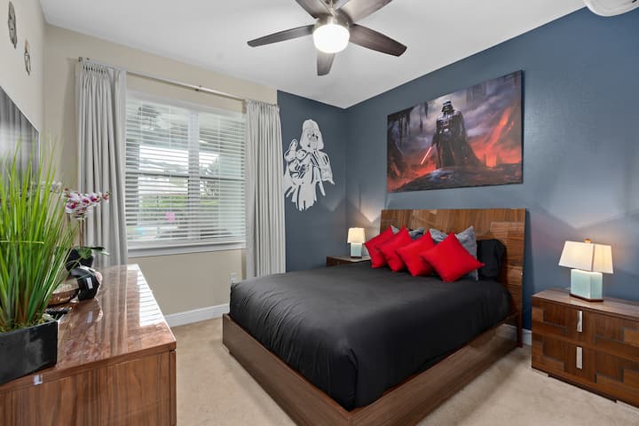 This Star Wars-themed room immerses you in the galaxy with Darth Vader decor, capturing his iconic presence. The ambiance is intense,  Vader’s images, makes it feel like you’ve stepped straight into the Star Wars universe. (Queen Bed)
