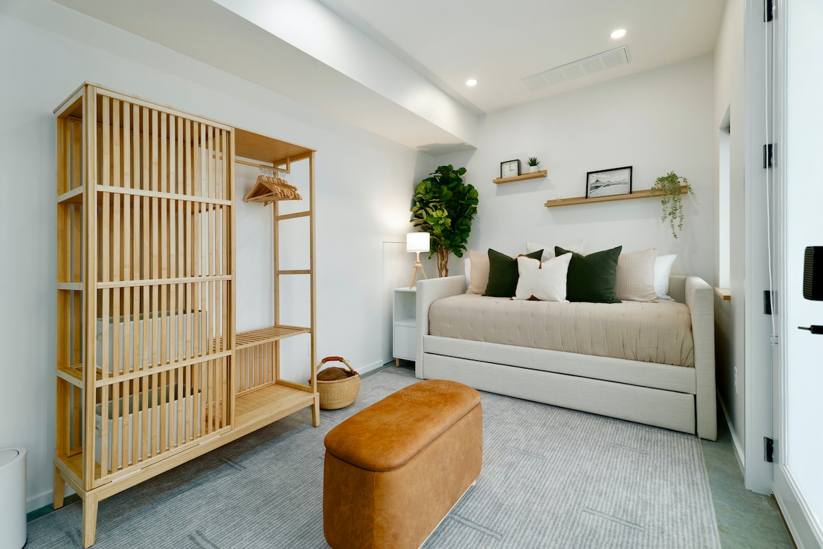 Relax in Scandinavian simplicity with our custom West Elm daybed, featuring a premium Helix mattress with natural wood accents and cozy textures.