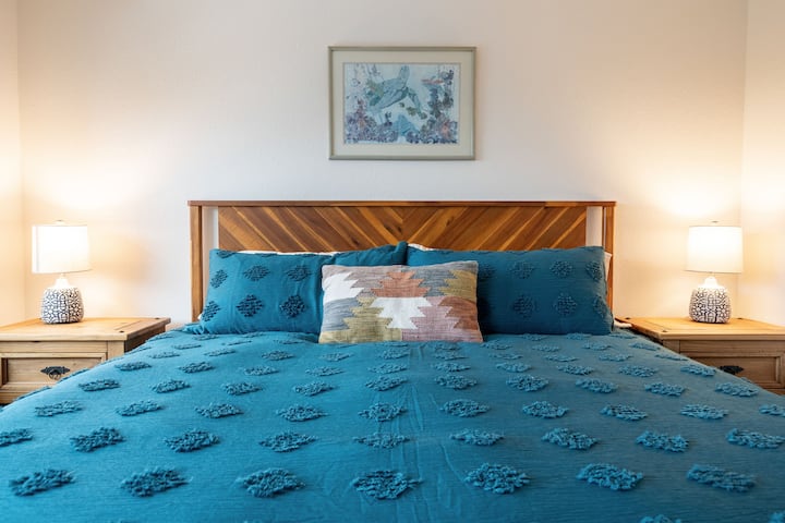 The bedroom features a King-sized bed with comfortable mattress. You'll never want to leave!