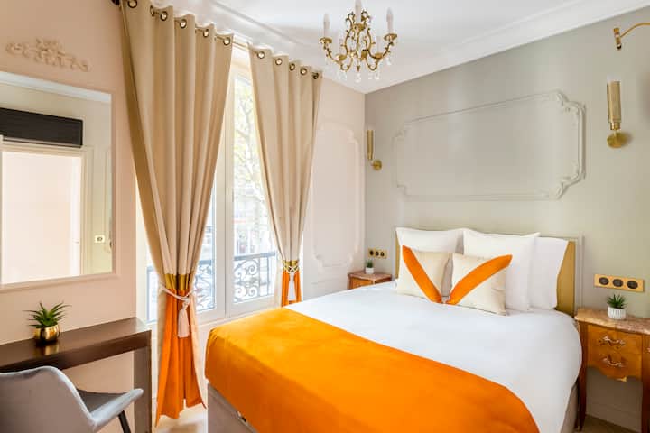 Chambre élégante Merveil Paris