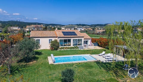 Modern villa with pool in quiet village
