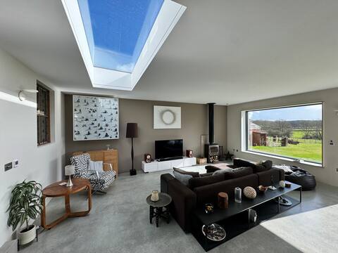 Bright spacious home with natural swimming pond