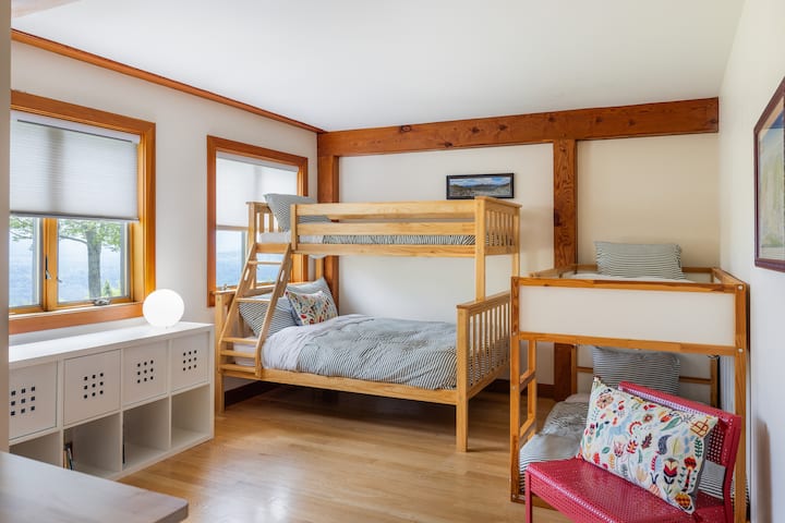 With mountain views and built-in whimsy, this bright bunk room invites adventure and bedtime giggles. A perfect nook for little ones, big kids, and grown-ups who still believe in sleepovers.