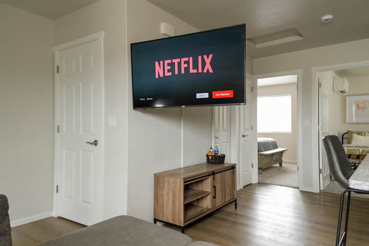 Get cozy in front of the 55" TV as you watch your favorite show or revisit your beloved movie!
