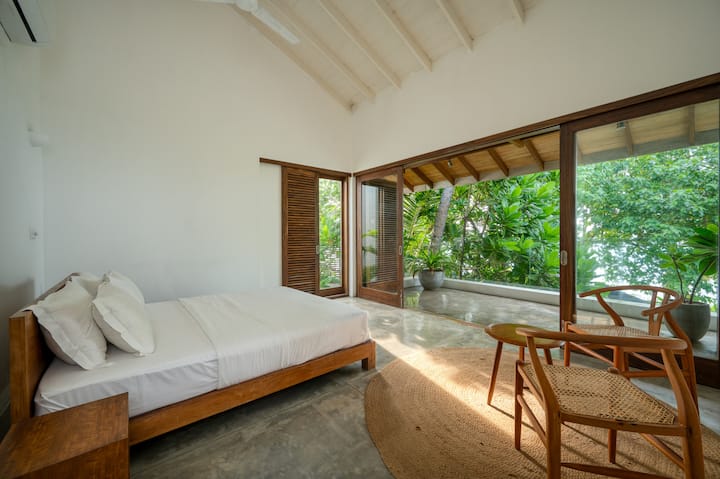 Upstairs king bedroom with private ensuite and balcony