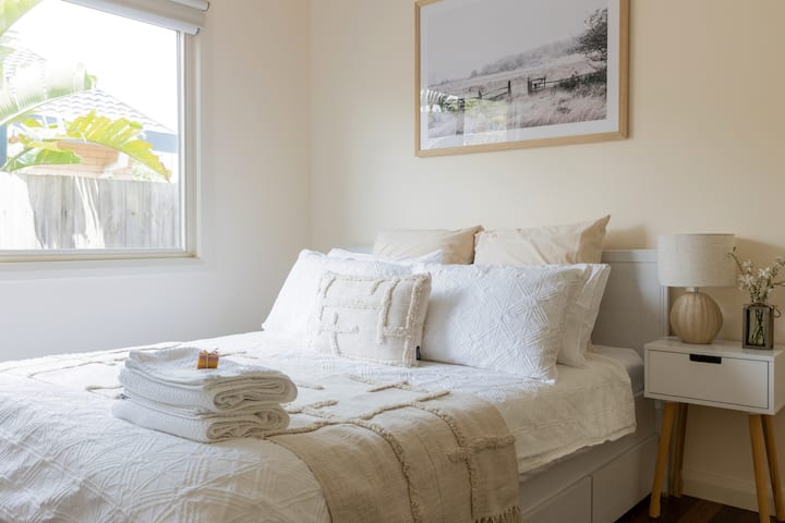 Main House Bedroom 3 | Queen sized bedroom with ample cupboard space and shelving.