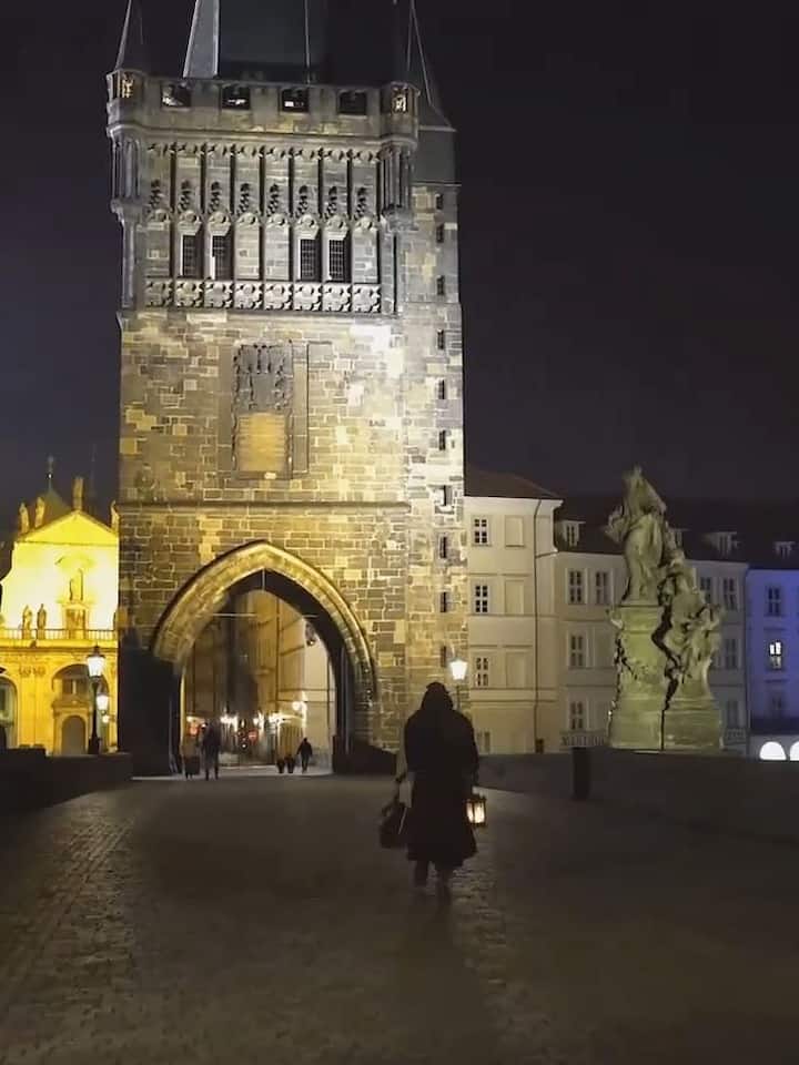Walking over the famous Charles Bridge