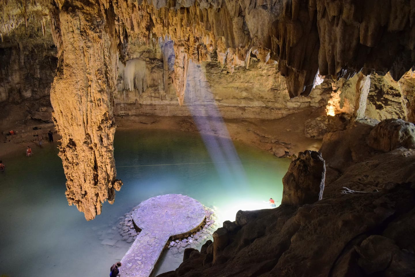 tulum cenotes: woman at cenote azul natural jungle pool in the yucatan peninsula, mexico