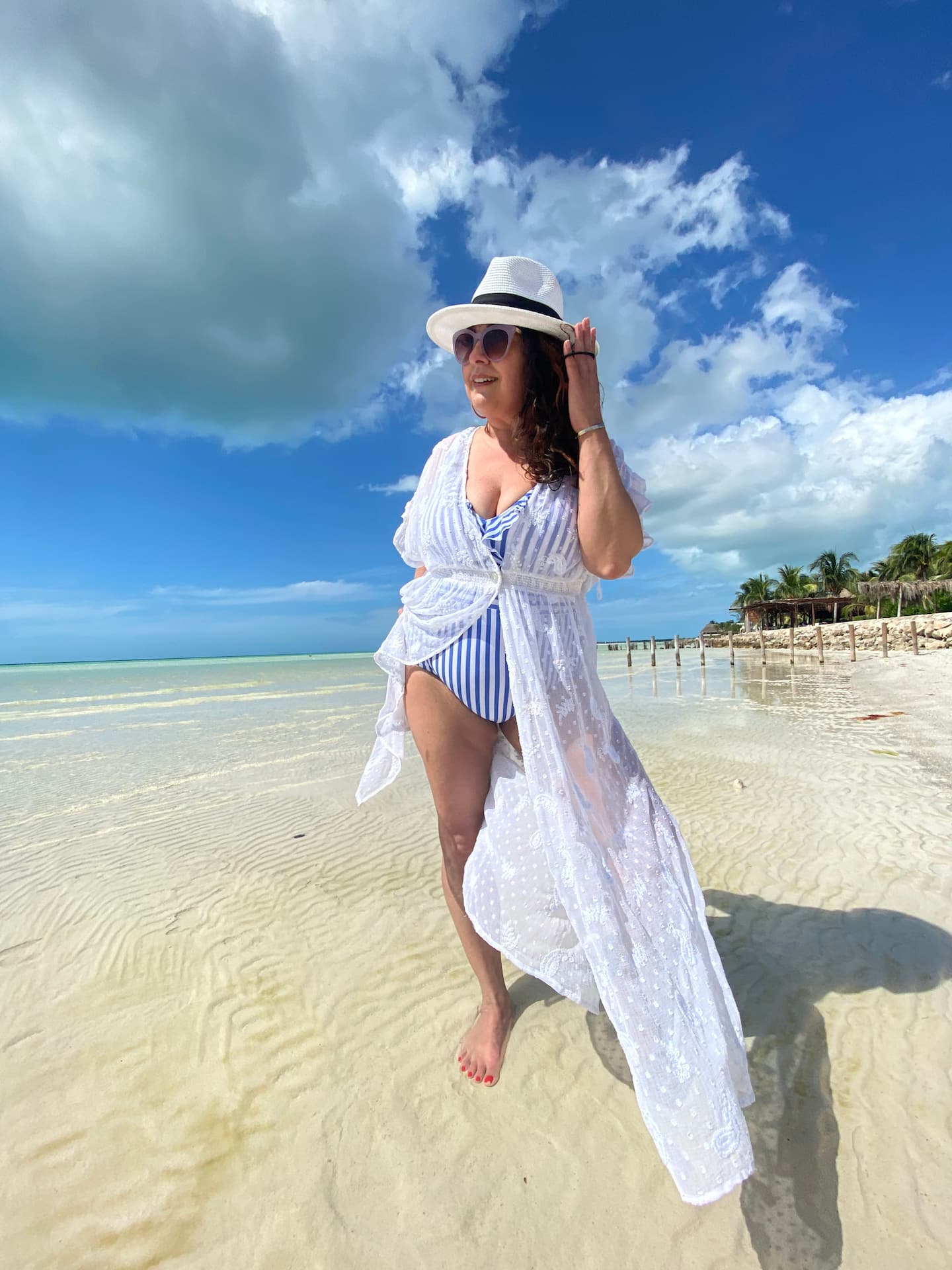 woman on the beach in holbox island mexico