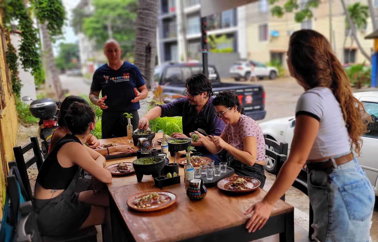 guests eating Mexican dishes after Puerto Vallarta cooking class