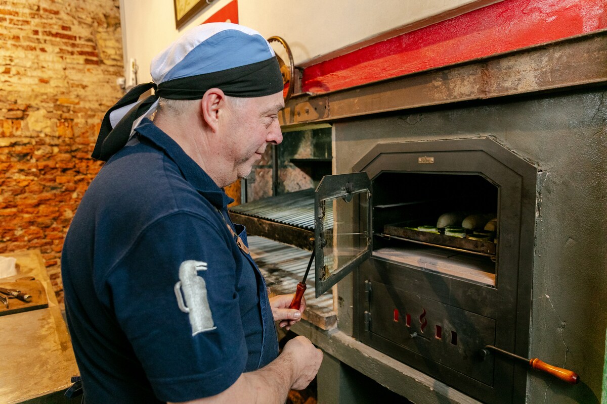 Share an Argentine barbecue with a local family