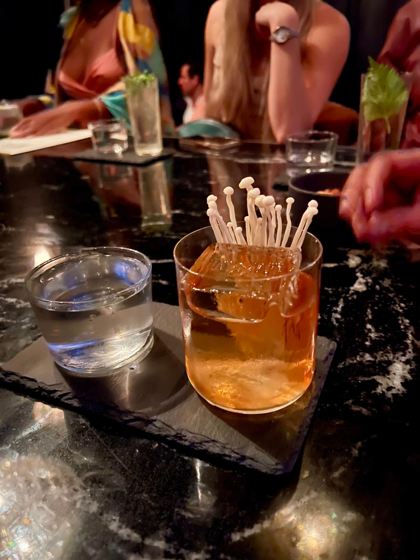 Mezcal with orange slices on the side