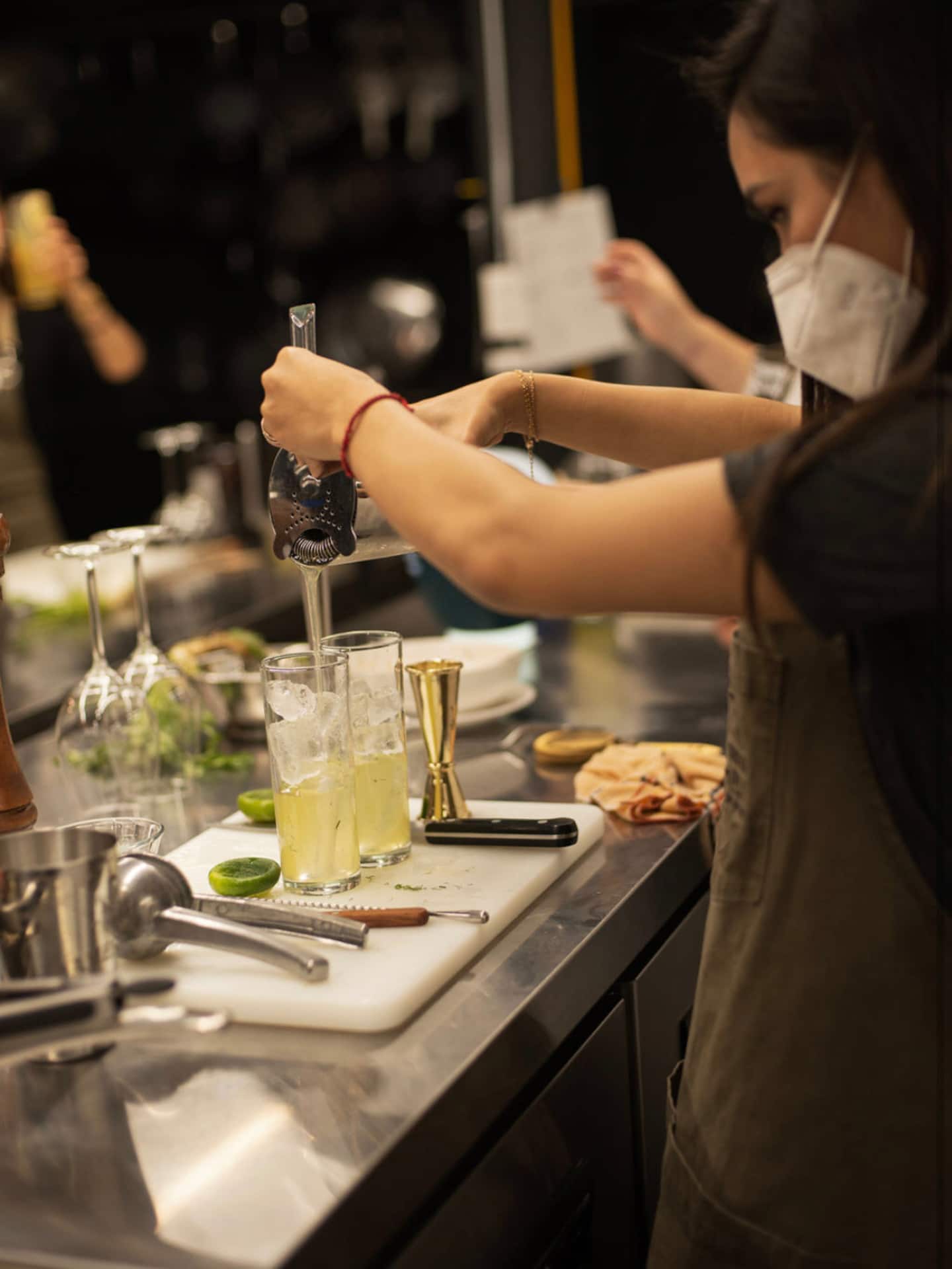 woman preparing mezcal