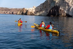 Paddle to Greek caves with pic-nic & snorkeling