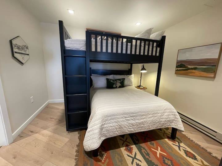 Experience comfort in our second bedroom with two full beds and a private en suite bathroom. Perfect for friends or family, unwind in style and enjoy the same luxurious amenities as our first bedroom.
