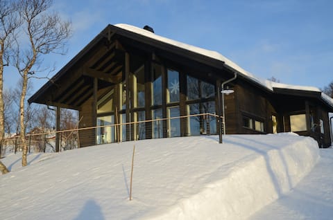 Modern mountain cabin with panorama