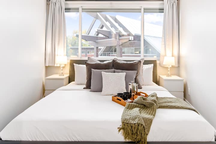 Comfortable king bed in the serene master bedroom.