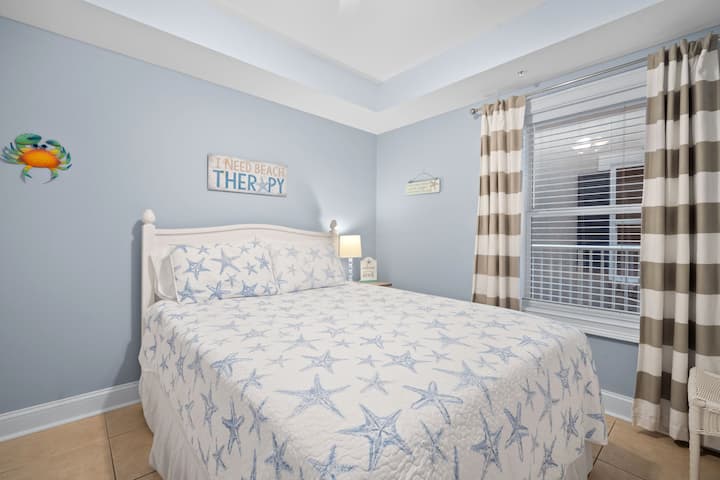 Queen Bedroom with TV with cable/hbo.  Xfinity app allows you to login to your Hulu, Netflix and more;  Closet with hangers, dresser for storage, luggage rack