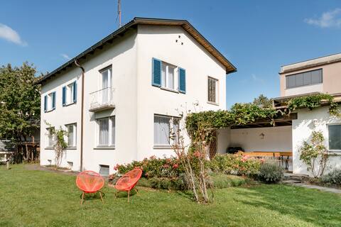Architectural house with large garden near center