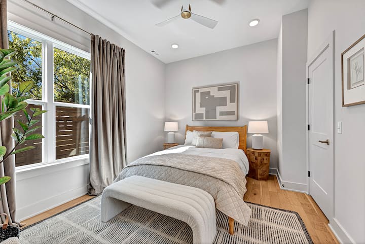 The ground floor en suite, which is the only bedroom down stairs, has a lovely queen bed with a walk in closet and large attached bathroom.