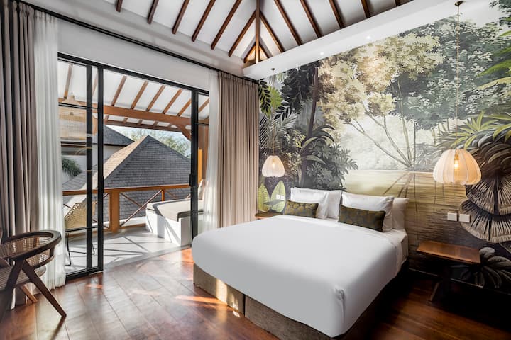 Indulge in the lap of luxury with a stay in our villa's bedroom, where sophistication meets serenity