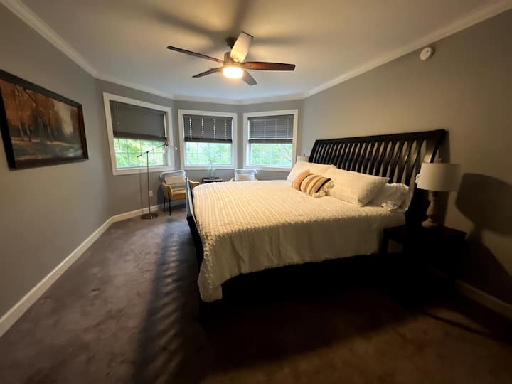 Primary bedroom with extra sitting area