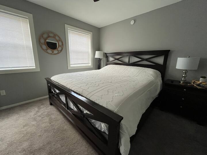 Bedroom with king bed and TV