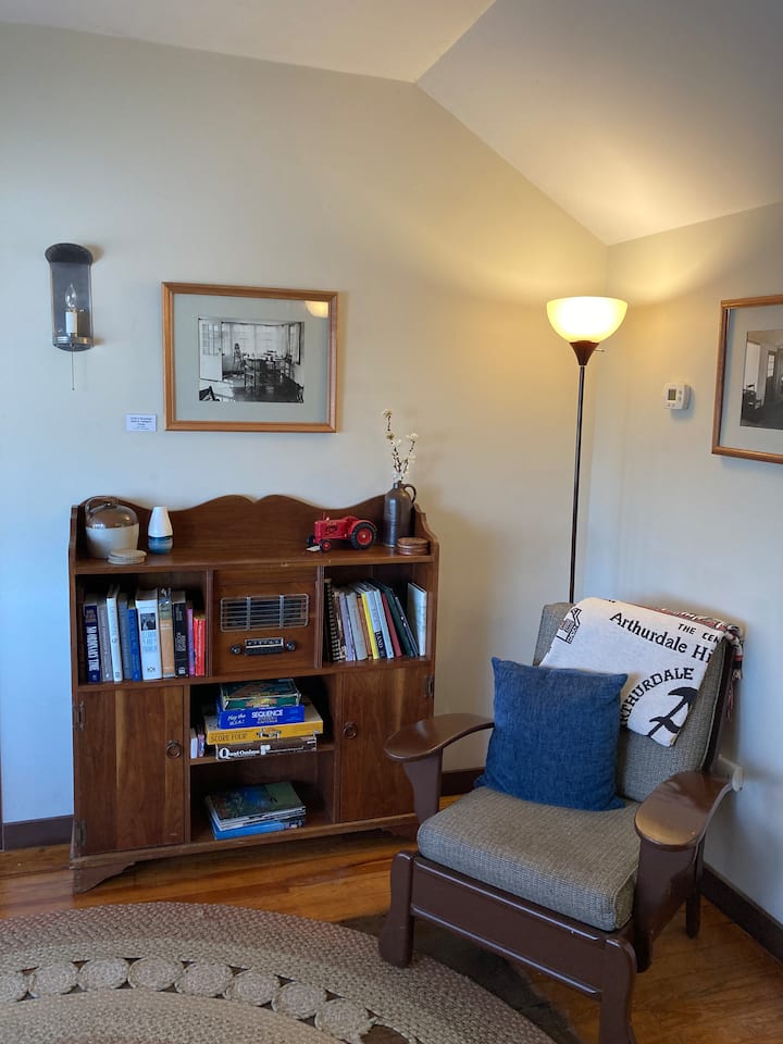 Curl up with a good book, watch TV or just enjoy the view from this cozy nook in the living room. 