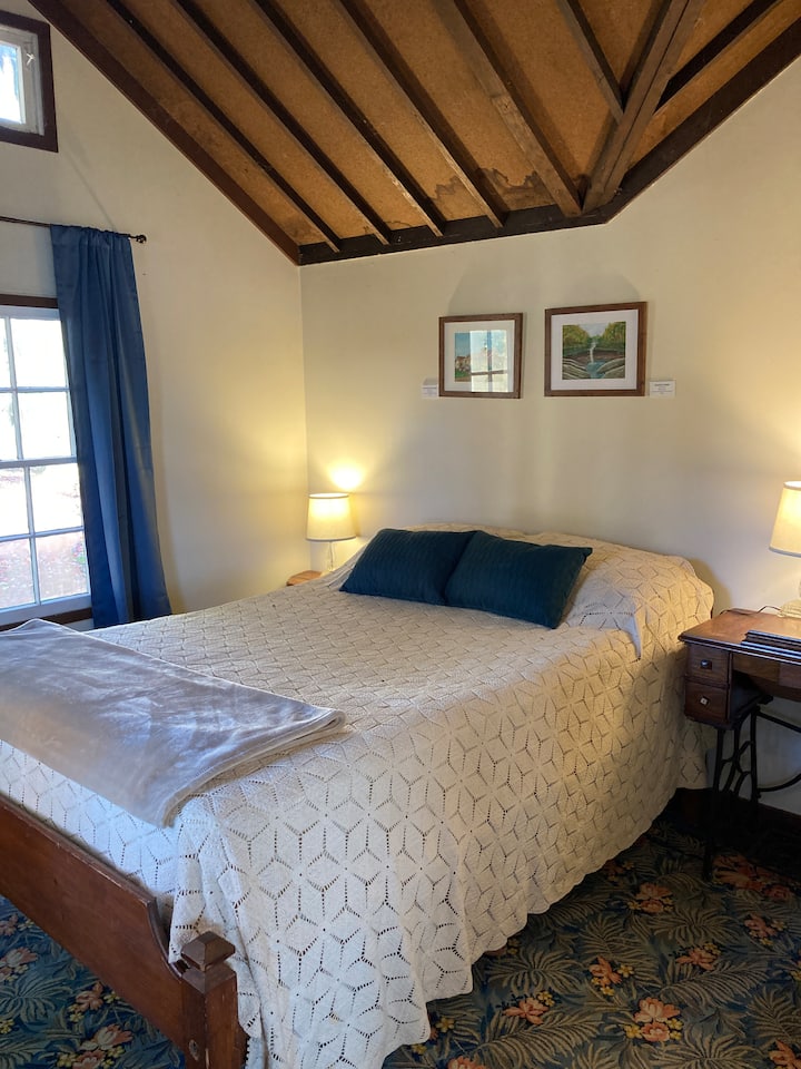 Full size bedroom with a very comfortable mattress.  The windows have room darkening blinds.  