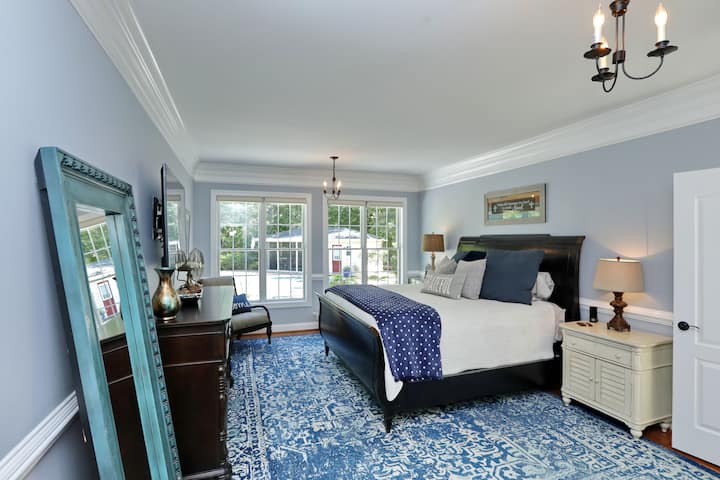 Master Bedroom main level with View of the backyard pool