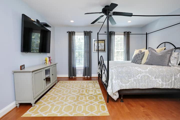 Bedroom 4 Upstairs. King Sized Bed with large flat screen TV and private bath attached with walk in shower and large closet. 