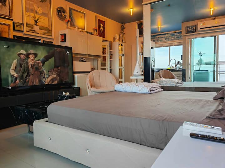 65-inch 4K LG TV, and Apple TV device with Free Netflix, Free worldwide live channels, movies, and series, Dual-band Internet router that offers a speed of up to 800 Mbps, Xiaomi fan...