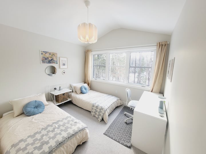 These two twin beds can be combined side by side in to a single queen sized bed, or left separate for those that enjoy waking up in their own beds.  The latter will save you time from making a pillow wall. (unless you want to make one)