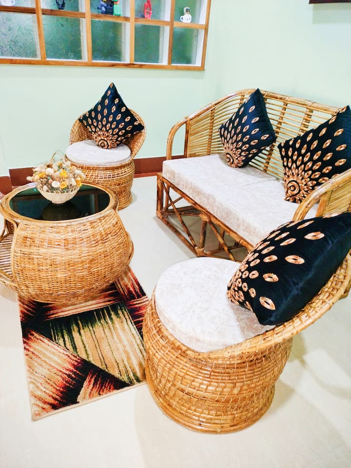 Cane sofa in living room 