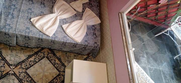 2 - Smaller room, only has ceiling fans.