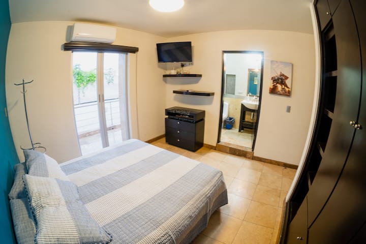 Room 2. Equipped with full bathroom and Smart TV.