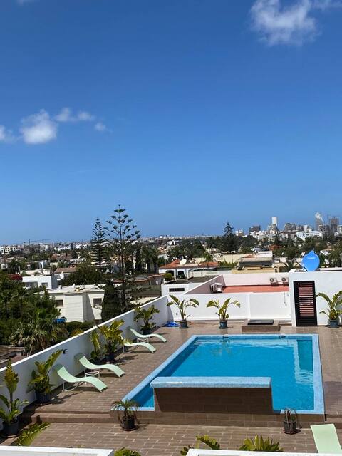 Cozy Apartment with Rooftop Pool
