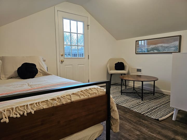 Bedroom #4 has a twin bed with a pull-out trundle bed (also twin). It has a sitting area and a small balcony that has a view of the lake.